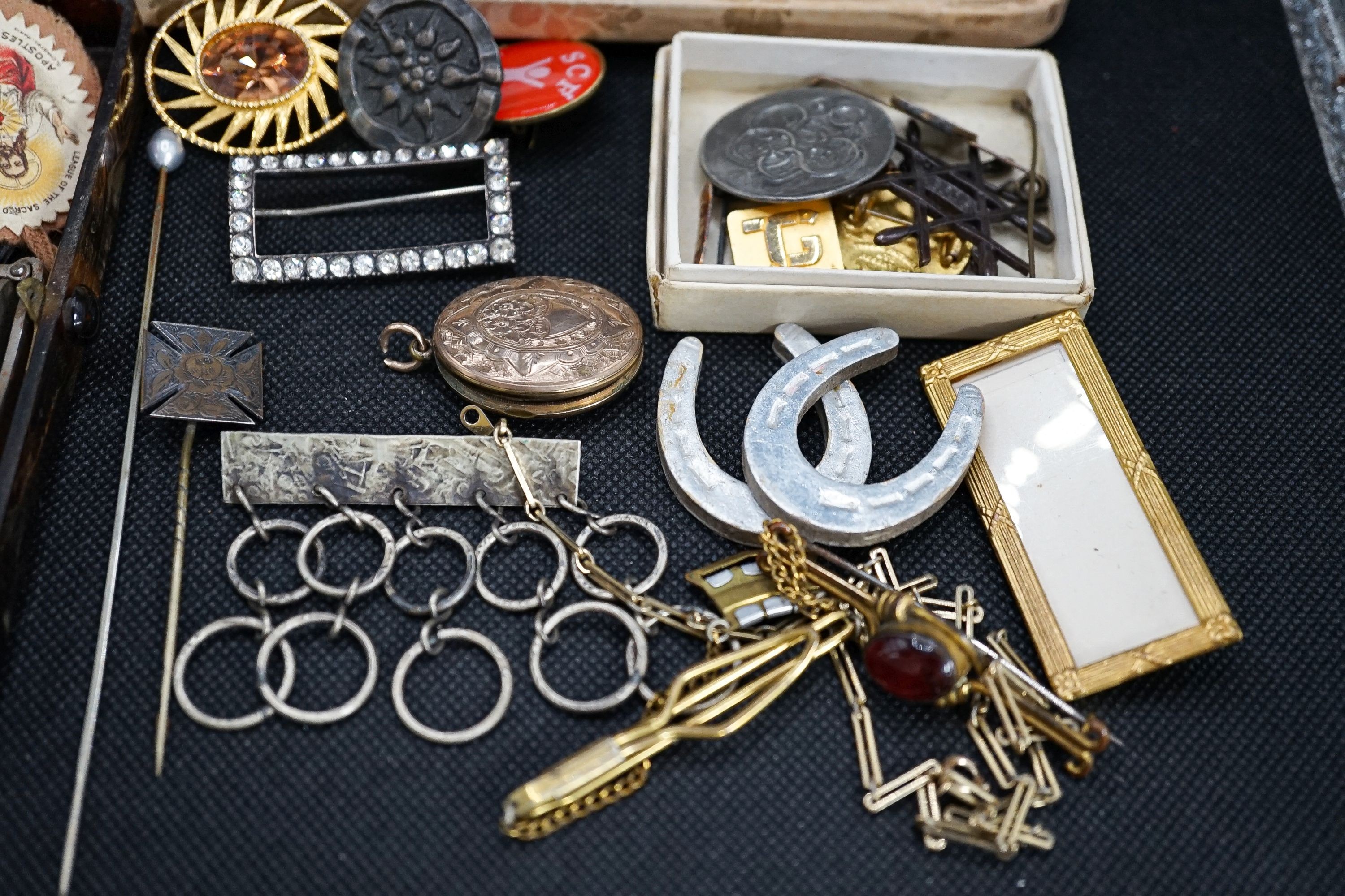 A group of costume jewellery to include a Hermes travelling timepiece.